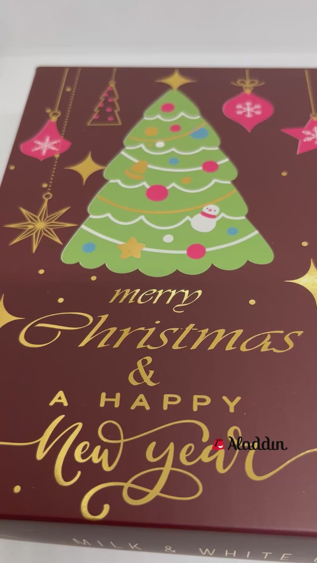 شوكولاتة إيما بالحليب وكرات الشوكولاتة البيضاء المحشوة بكريمة جوز الهند - علبة عيد ميلاد مجيد - 250 جرام